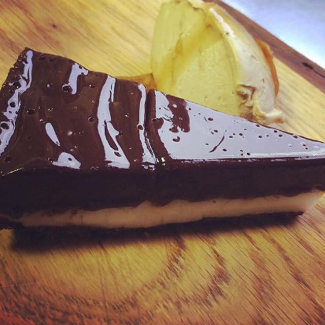 Delicious sweet treats to round of our big outdoor food menus, barbecue in the Sussex countryside catered by The Secret Restaurant for example the image shows a generous slice of our ‘After-eight’ & coffee - soft chocolate with peppermint fondant & an espresso mascarpone